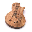 Indgraverede guitarplektre af træ