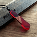Halskæde af træ og harpiks